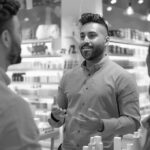 Promoter engaging customers in store